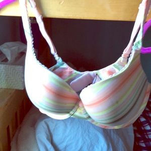 A multi colored Victoria secret bra(never worn)